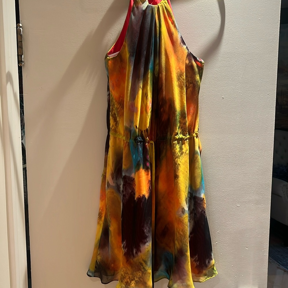 Halter style party fun dress with drawstring waist.